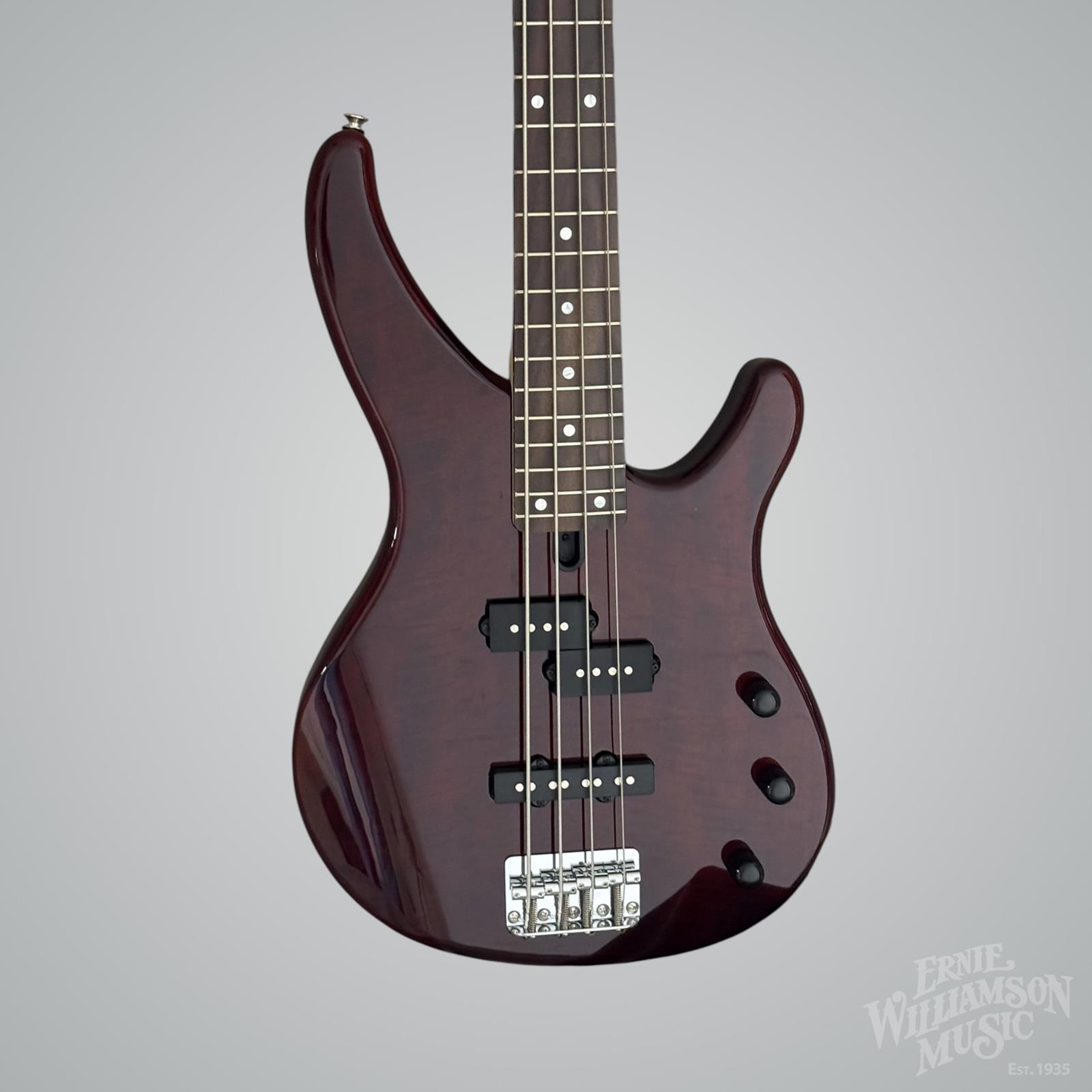 Yamaha 4-string; Exotic wood, flamed mango top, solid alder body, maple neck, rosewood fingerboard, one split single-coil and one straight single-coil pickup; Root Beer